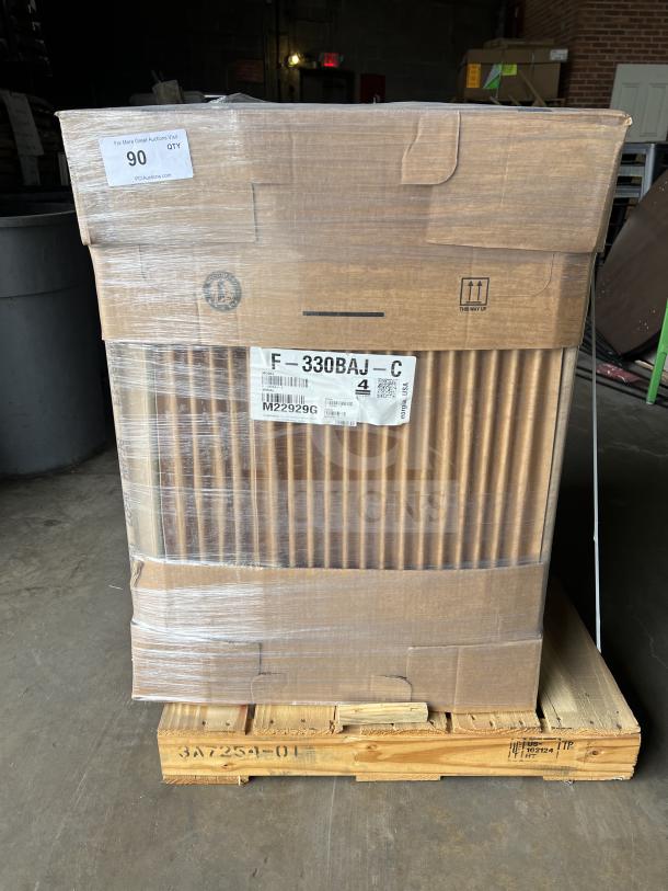 Brand new Hoshizaki Model F-330BAJ-C ice machine in box, with serial number M2292G. Includes built-in storage, air-cooled.