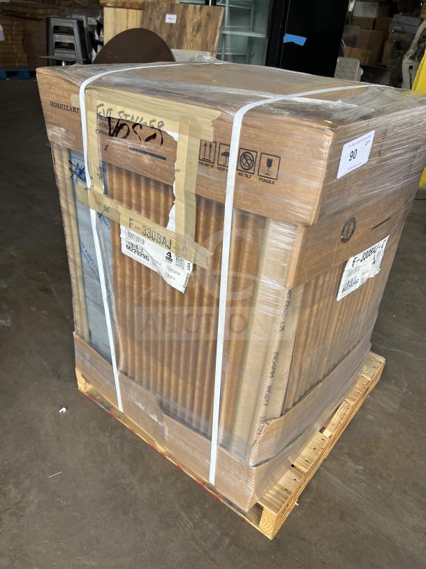 New Hoshizaki cubelet ice machine F-330BAJ-C in box, model: F330BAJC, 115V, with built-in storage, air-cooled, on legs.