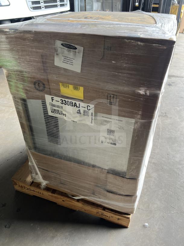 Brand new Hoshizaki F-330BAJ-C ice maker, electric, air-cooled, stainless steel, with storage bin, model SN: M2292G, 115V, boxed.