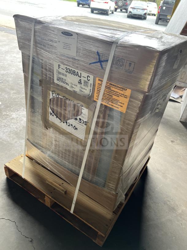 Brand new Hoshizaki F330BAJC ice machine, stainless steel, air-cooled, in box with tags, includes built-in storage bin.