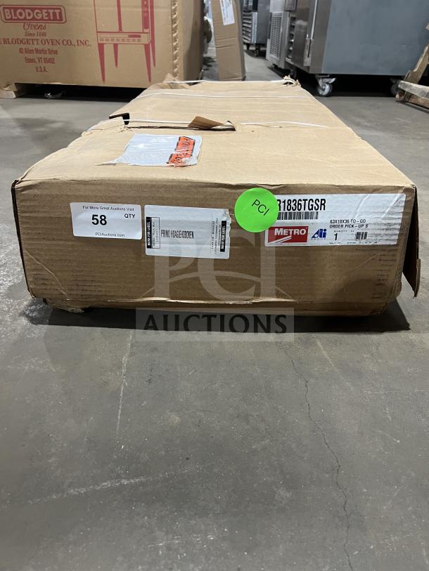 Brand new Metro Commercial 36" stainless steel wire shelving, model CR1836TGSR, in original box. SN: 10279781. On legs.