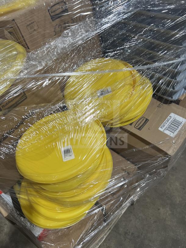 Mixed pallet with Rubbermaid Commercial Yellow Lids, Model FG572500YEL, in shrink wrap. Adjacent labeled boxes visible.