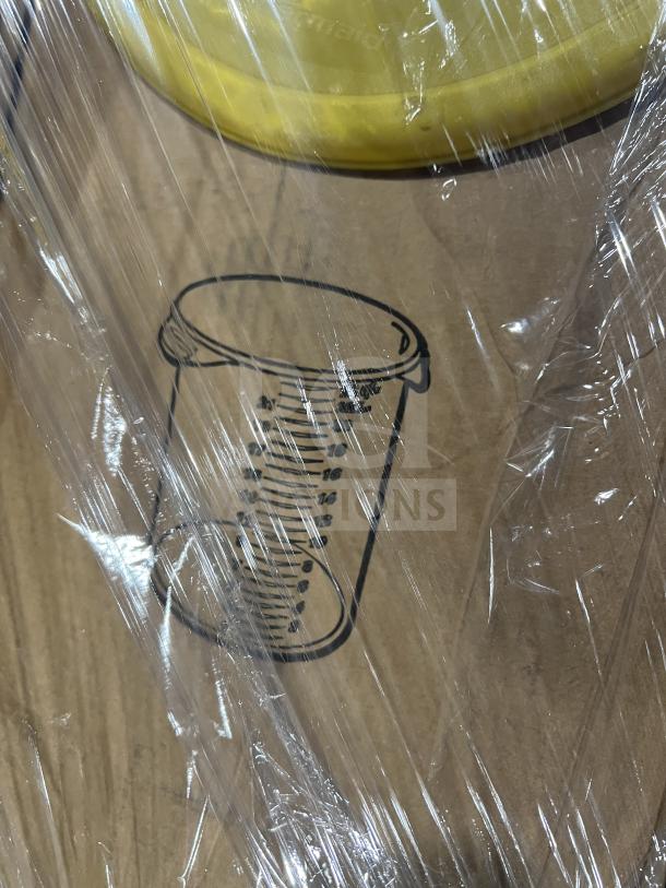 Mixed pallet wrapped in plastic, featuring commercial kitchen items including Rubbermaid yellow lids, and other storage solutions.