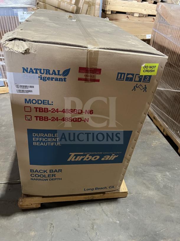 Brand new Turbo Air TBB-24-48SGD-N black 2-glass door bar back cooler in box, with stainless steel worktop, 110-120V.