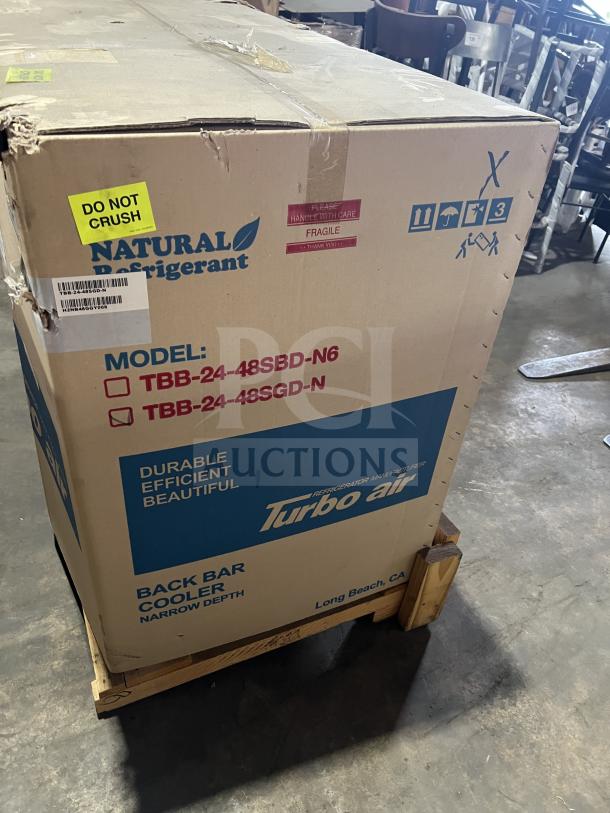 Brand new Turbo Air TBB-24-48SGD-N bar back cooler in box, features 2-glass doors, stainless steel worktop, 110-120V.