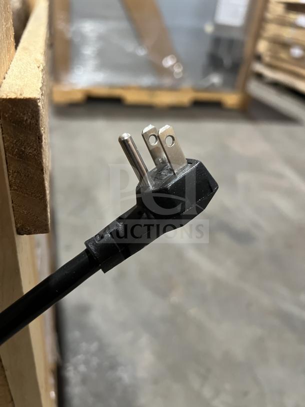 Close-up of a three-prong power plug for the Everest EPBR1 prep table, showing standard 115V connection.