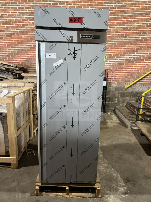 Brand new Hoshizaki F1A-FS stainless steel one-door commercial freezer. Includes wired racks. Model: F1AFS SN: M53952B.