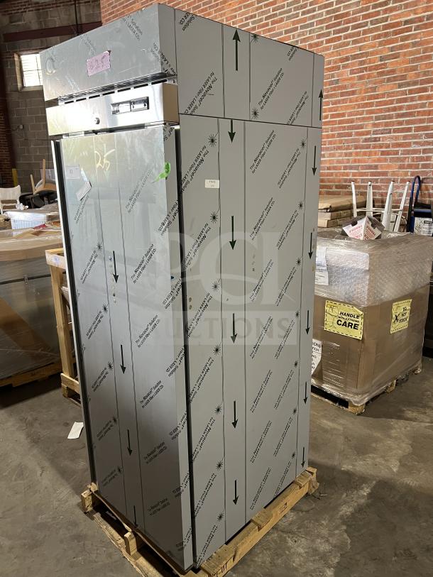 Brand new Hoshizaki F1A-FS stainless steel reach-in freezer, with protective cover, wired racks, and 115V 1 phase.