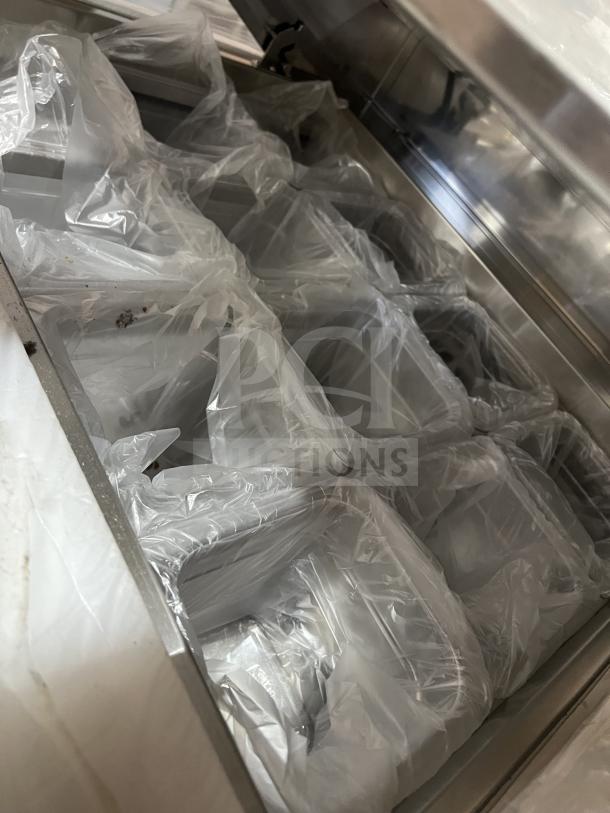 Everest EPB Series stainless steel bain marie prep table, model EPBR1, with food pans and refrigerated base, in original packaging.