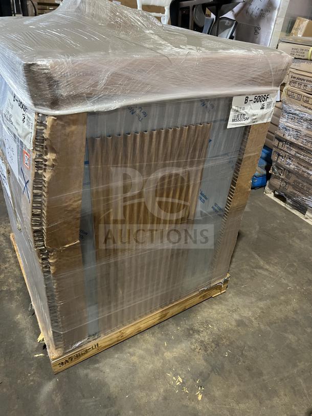 Brand new Hoshizaki B-500SF 30" ice storage bin, in box, on legs, wrapped in plastic, model and serial number visible.