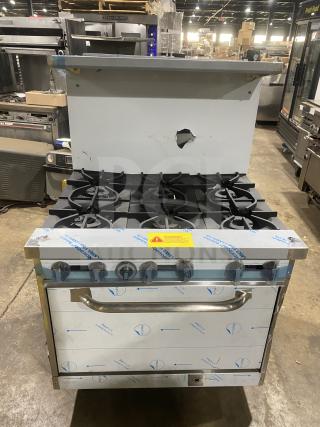 Brand new Kutano 36" 6-burner stainless steel range/oven combo, model KUT6BRN36N6, natural gas powered, with wired rack.