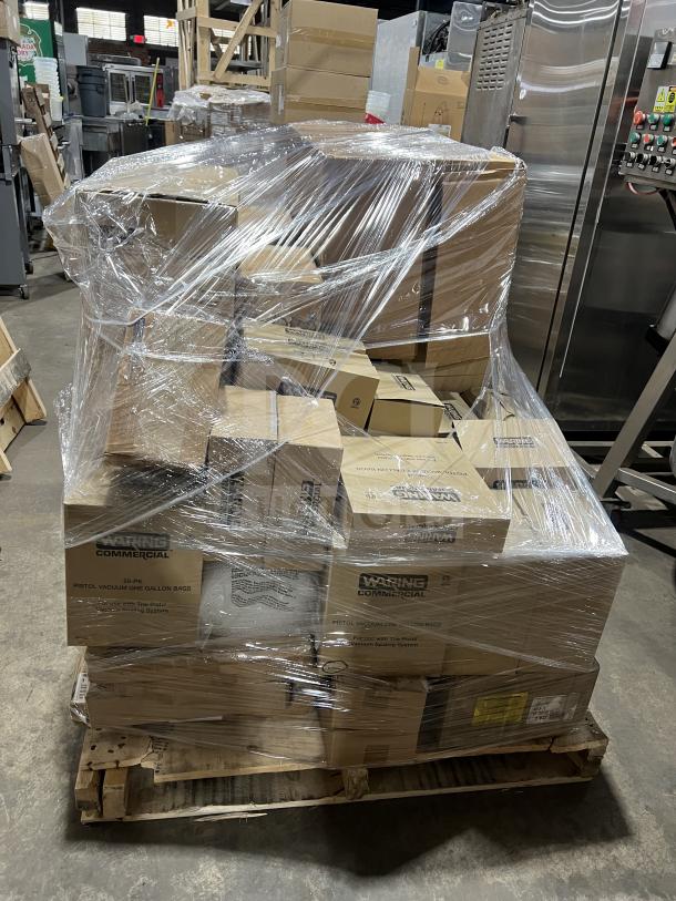 Brand new mixed pallet with Waring and Adcraft commercial kitchen supplies, wrapped in clear plastic for auction.
