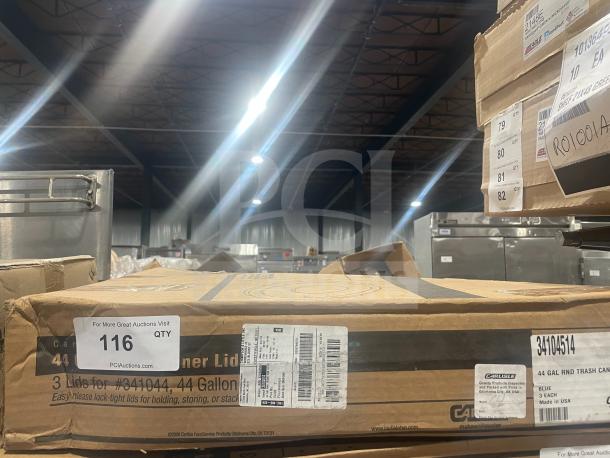 Carlisle Model 34104514 blue 44 gal trash can lids, brand new in box. Includes 3 lids. Box labeled with model and specs.