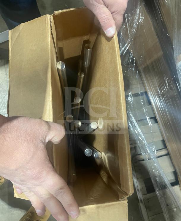 Brand new American Metalcraft Commercial Aluminum Pizza Peel, boxed, model American Metalcraft, multiple handles visible.