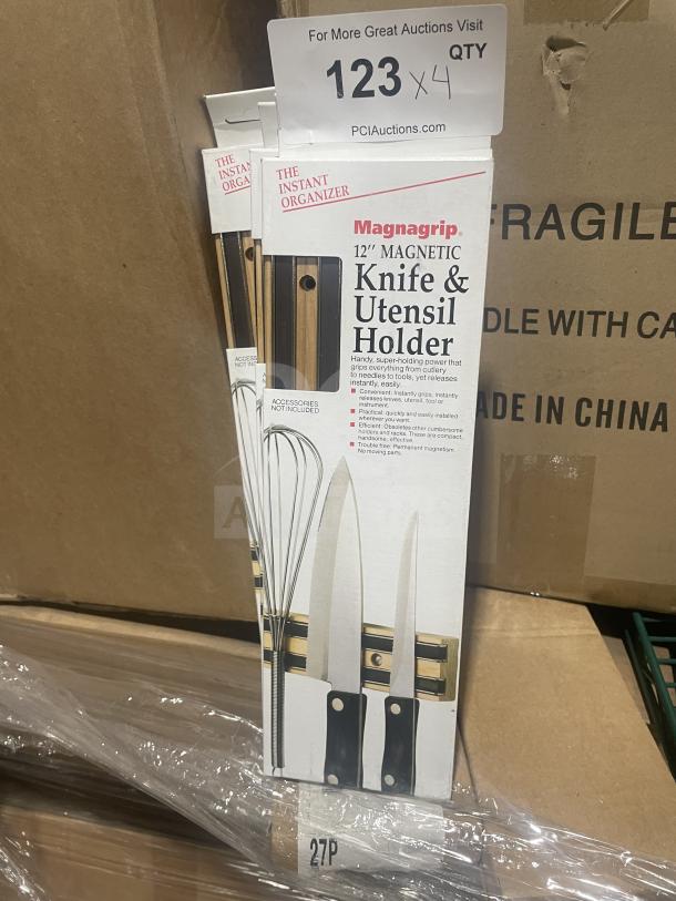 Brand new Magnagrip 12" magnetic knife and utensil holder in box. Features super-holding power. Made in China.
