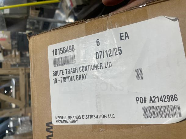 Brand new Rubbermaid Brute Series gray trash container lid in box, 19-7/8" diameter, labeled for commercial use.