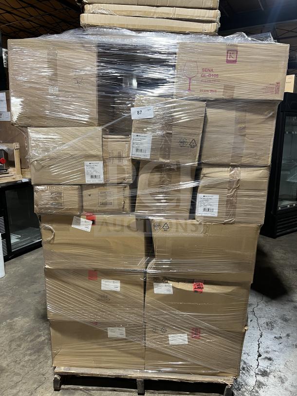 Pallet with branded boxes including 91 dinner plates, 3 ramekin boxes, side dishes, display plates, wine glasses. New condition.