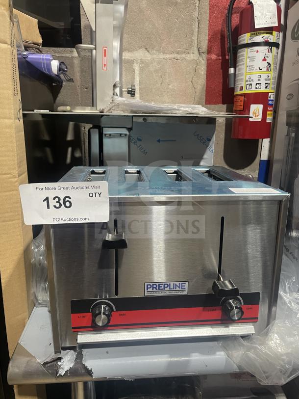 Prepline CT120 stainless steel 4-slice toaster, brand new. Commercial model with dual controls and sleek design.