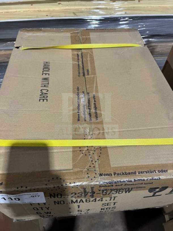 Brand new Spring Round Sauteuse Server Inserts, Model 2372, in original sealed box. Handle with care markings visible.