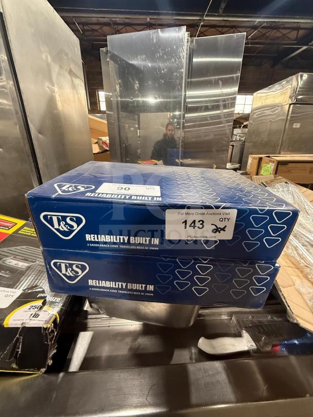 New T&S add-on faucet attachment, in box. Includes 2 units. Boxes labeled "Reliability Built In." Item 143.