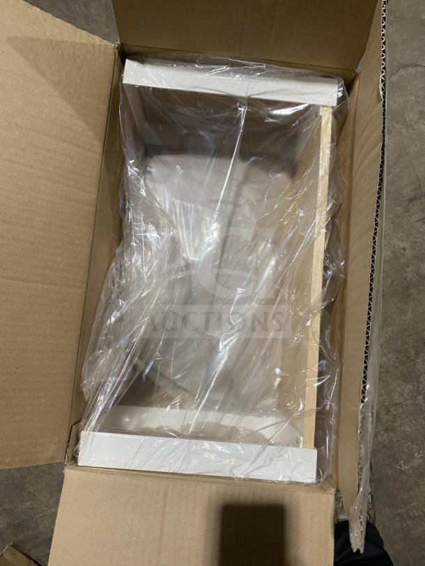 Boxed item in new condition with protective plastic. Part of a mixed pallet auction. Contains commercial kitchenware.