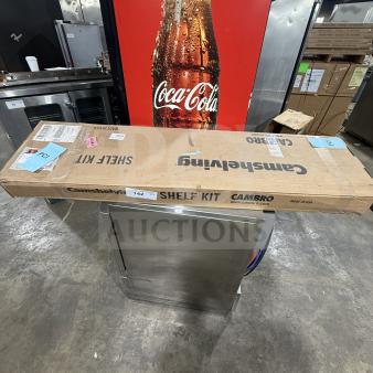 New Cambro Cam Shelving unit in original packaging with visible labels indicating model and make.