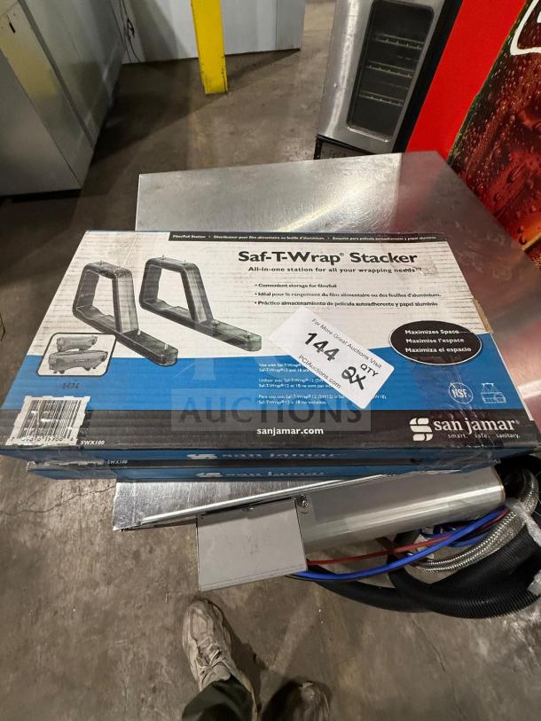 New in box San Jamar Saf-T-Wrap Stacker, model SWX100. Features include space-saving design for film/foil storage.