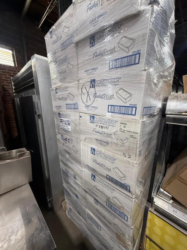 Cases of Fash'n Point guest towels, new in boxes, with Hoffmaster branding, model FP1207. Auction offers 52 boxes.