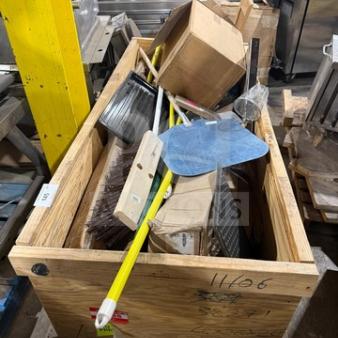 Crate full of miscellaneous restaurant ware including brooms, mop sticks, pizza peels, and boxes in new condition.