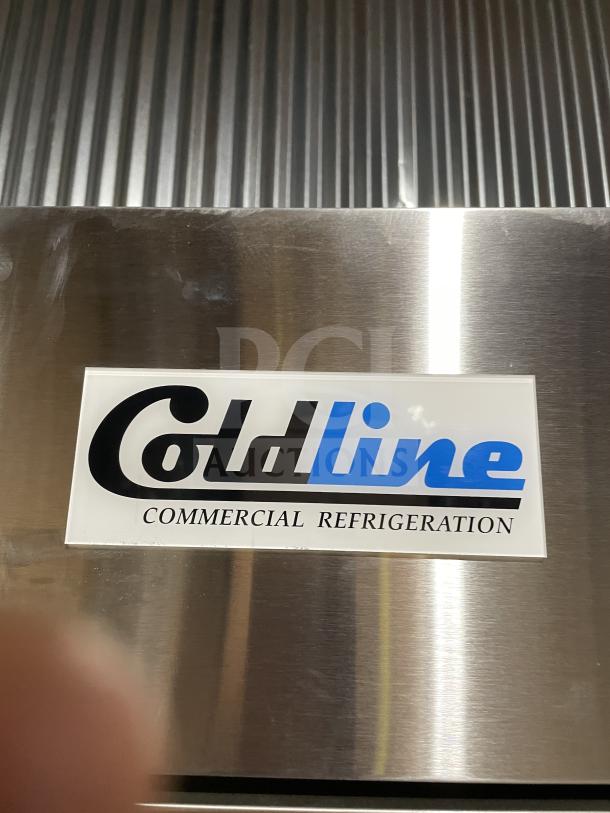 Coldline C19F commercial stainless steel reach-in freezer, new condition. Features solid door, 29", wired rack, 115V.
