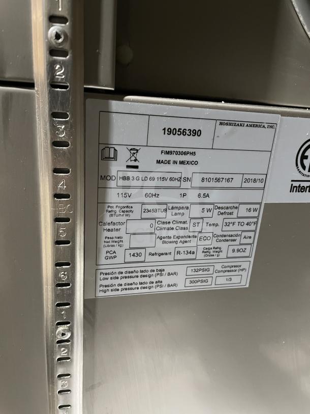 Brand new Hoshizaki HBB3GLD69 double glass door back bar refrigerator, black vinyl, stainless steel worktop, wired rack.