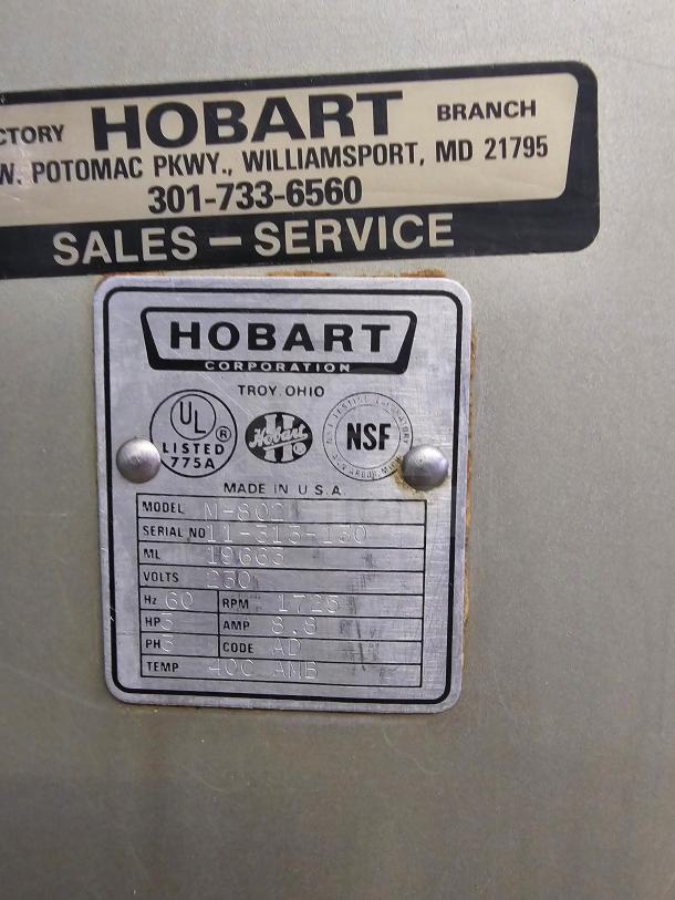 HOBART N-802 80Qt commercial mixer, 230 volts, includes attachments. Tags show model, serial number, and electrical specs.