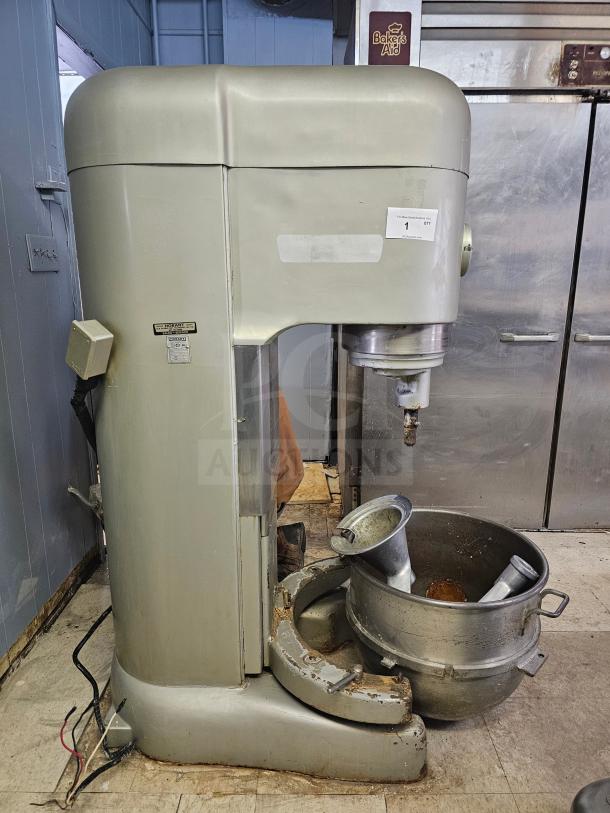 HOBART N-802 80Qt commercial mixer, 230 volts, with attachments. Visible wear, includes bowl and accessories.