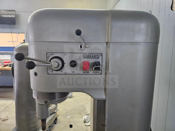 HOBART N-802 80Qt Commercial Mixer in good condition, 230 volts, features controls and switches, includes attachments.