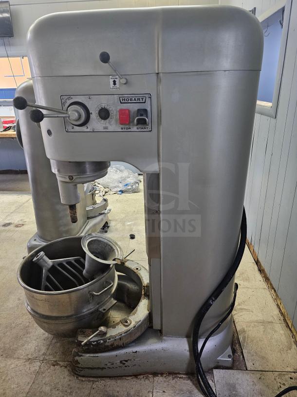 HOBART N-802 80Qt commercial mixer with attachments. Operating at 230 volts. Used condition, visible control panel and bowl.