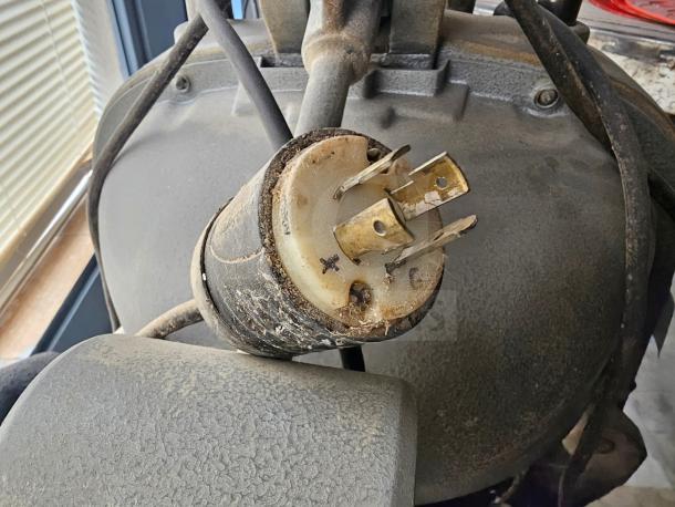 Commercial dough divider with visible wear, metal components, and electrical plug. Needs cleaning. Ideal for bakery use.