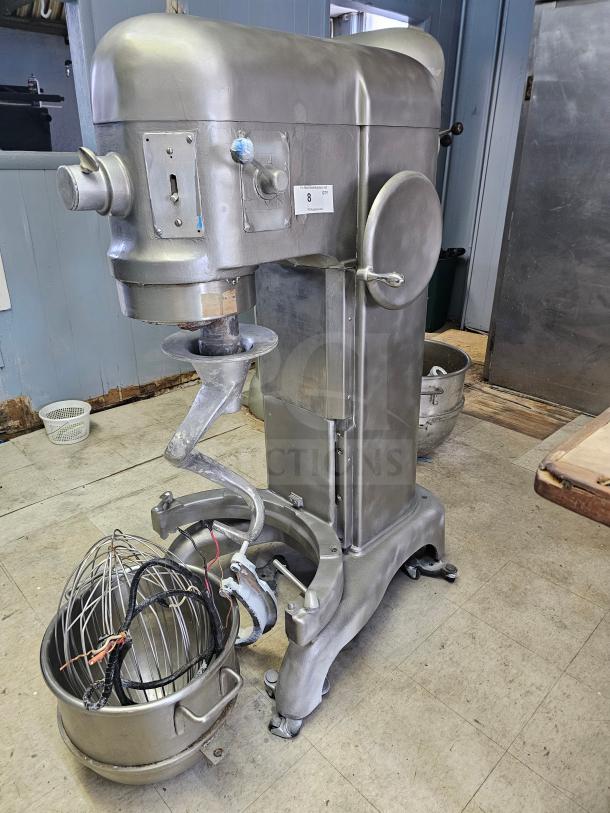 Hobart 60Qt commercial mixer with attachments, stainless steel, used condition, includes whisk and bowl, vintage model.