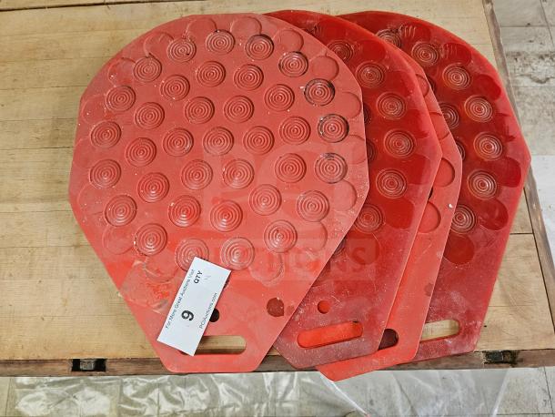 Red industrial bakery divider-rounder molding plates, circular pattern, good condition, auction tag attached.