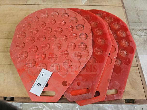 Red industrial bakery divider-rounder molding plates with circular patterns, good condition, auction tag visible.