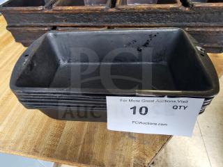 Black baking pan stack, used condition, rectangular shape, auction label indicating quantity of 10.
