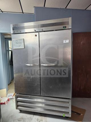 Beverage-Air KR48-1AS refrigerator, 2 solid doors, stainless steel, note on front. Used, visible wear.
