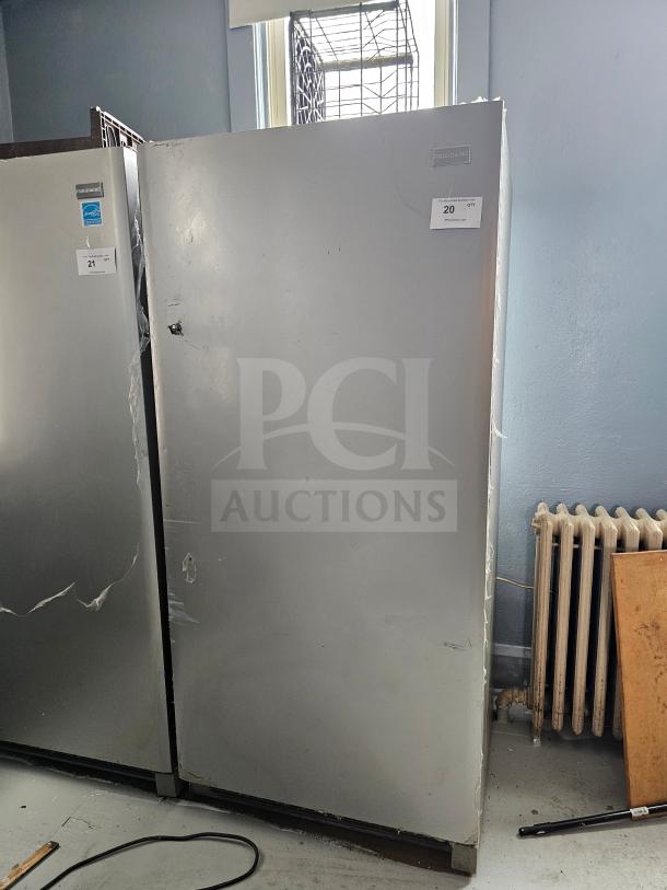 FRIGIDAIRE single door freezer, gray, missing handle, used condition, model number on label not visible, lot tag 20.