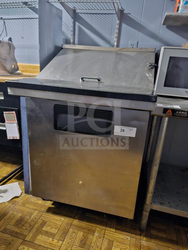 TRUE TWT-27 Single Door Sandwich Table, stainless steel, commercial grade, slight wear, auction label marked "24".