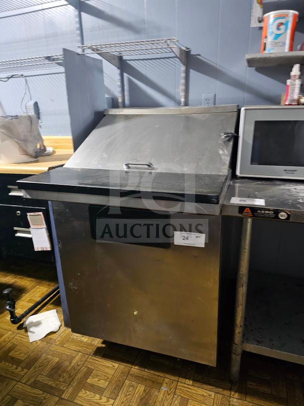 TRUE TWT-27 Single Door Sandwich Table, stainless steel, model TWT-27, features countertop, shows minor wear.