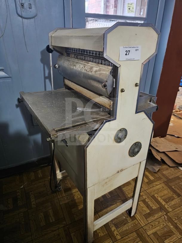 Oliver Machinery bread slicer, vintage model with manual slicer mechanism, metal construction, visible wear and auction label.