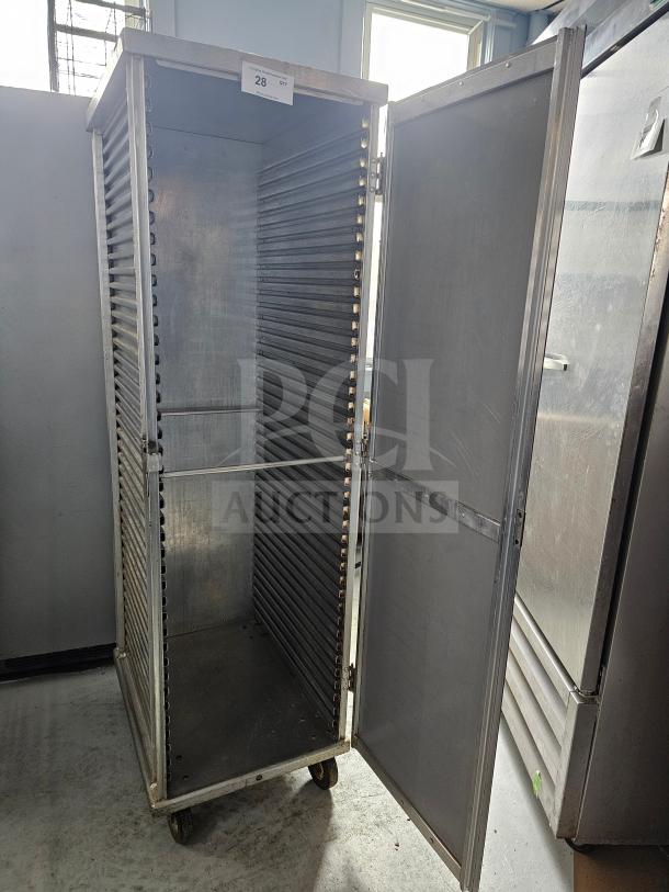 Sheet pan rack/cabinet with 20 slots, durable metal construction, casters for mobility, tag indicating item 28.
