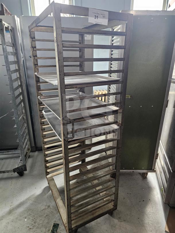 Aluminum sheet pan rack, 20 slots, used condition, visible number 31 tag, ideal for commercial kitchen storage.