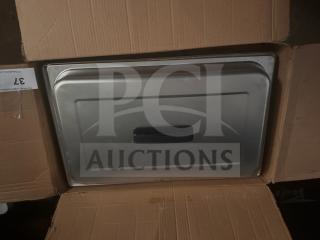 Full-size stainless steel chafer in box, new condition, with black handle. Auction tag visible, marked with number 37.