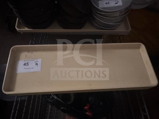 Long rectangular beige plastic tray with minor wear. Visible label: "45 QTY 17," indicating auction details.