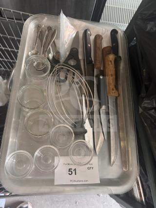 Assorted kitchenware including knives, utensils, glass bowls, and a whisk on a tray. Condition varies. Auction lot #51.
